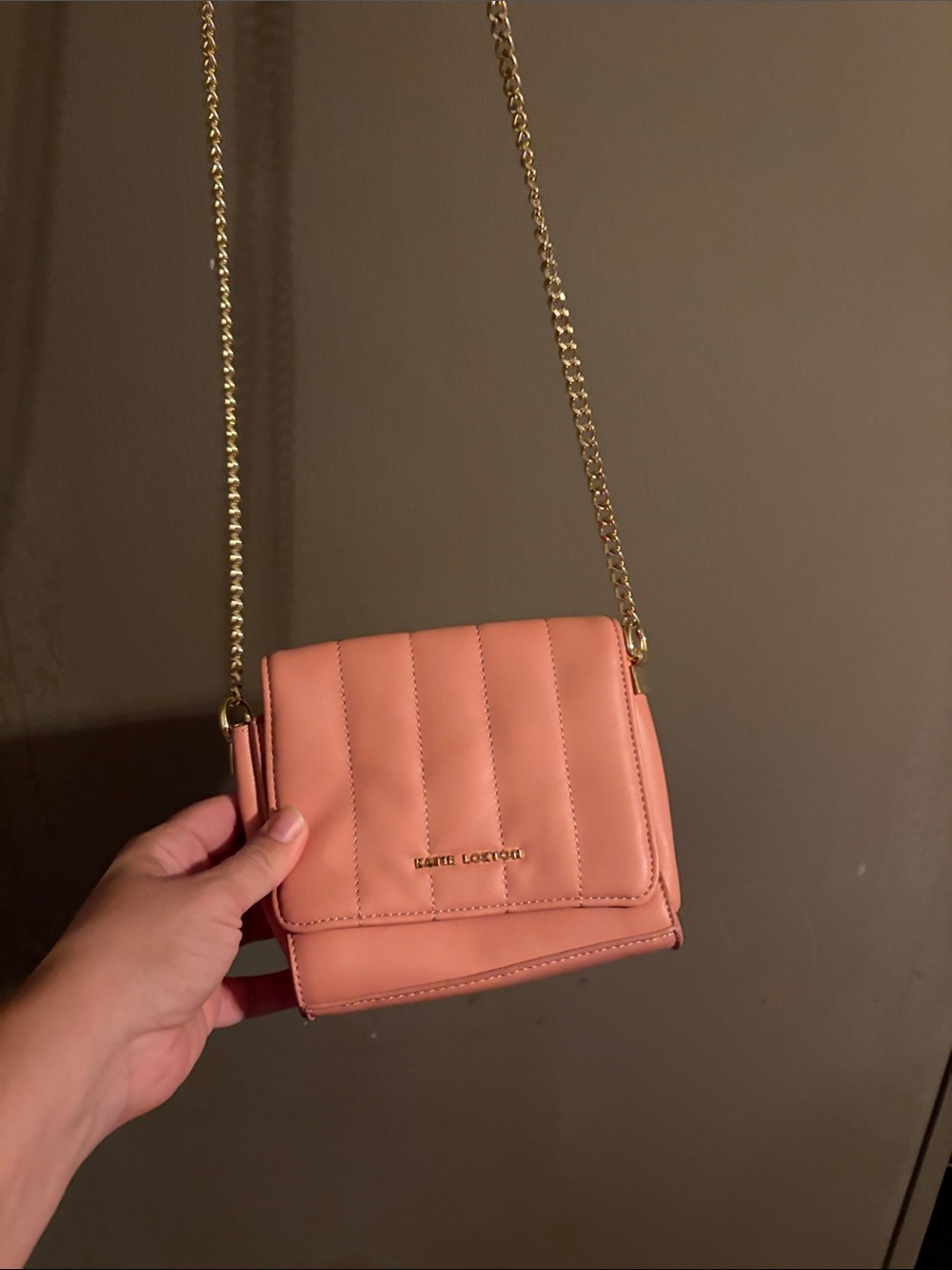 Katie Loxton pink quilted cross body with gold chain strap